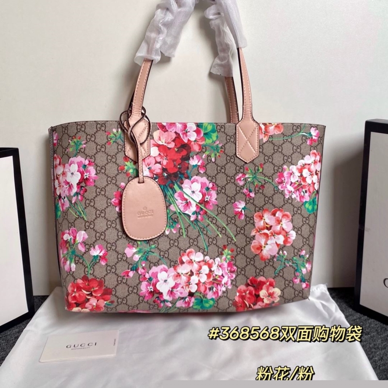 G*u*i shopping bags